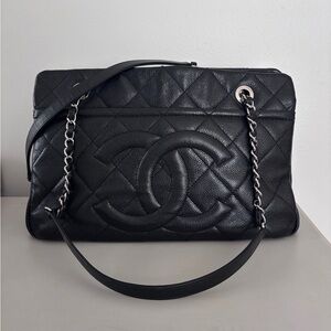 Chanel 2013 era shopper.  Black caviar with silver hardware.